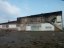 Outer wall where destroyed building once stood